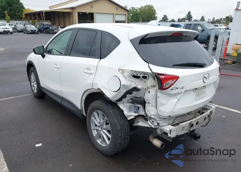 2015 Mazda Cx-5 Touring z USA, uszkodzony, nr VIN JM3KE2CY7F0546740